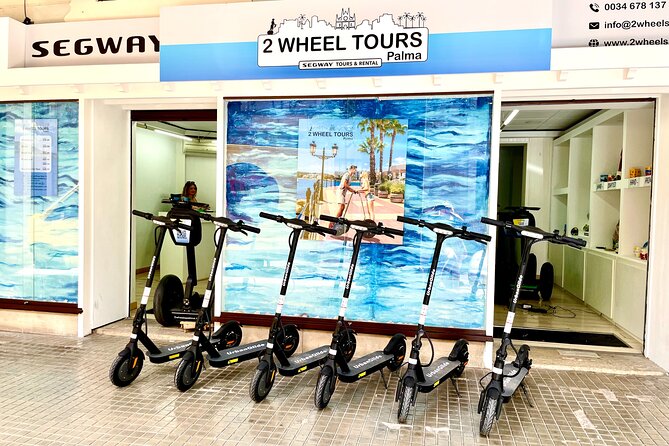 1.5 H Electric Kick-Scooter Tour - Plaça de Cort and the Olivera de Cort