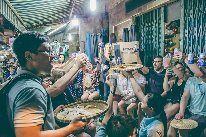 12 Tasting Street Food & Sightseeing By Scooter with Student - Walking through Ho Thi Ky Flower Market
