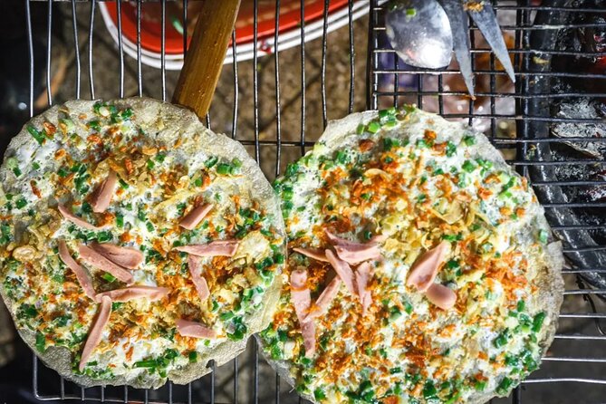 12 Tasting Street Food & Sightseeing By Scooter with Student - District 4 and the snack culture of Xom Chieu Market