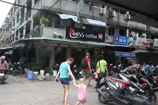 Afternoon Saigon Unseen Adventure by Scooter |Opt: Ao Dai Riders - Ho Thi Ky Flower Market and grilled oysters