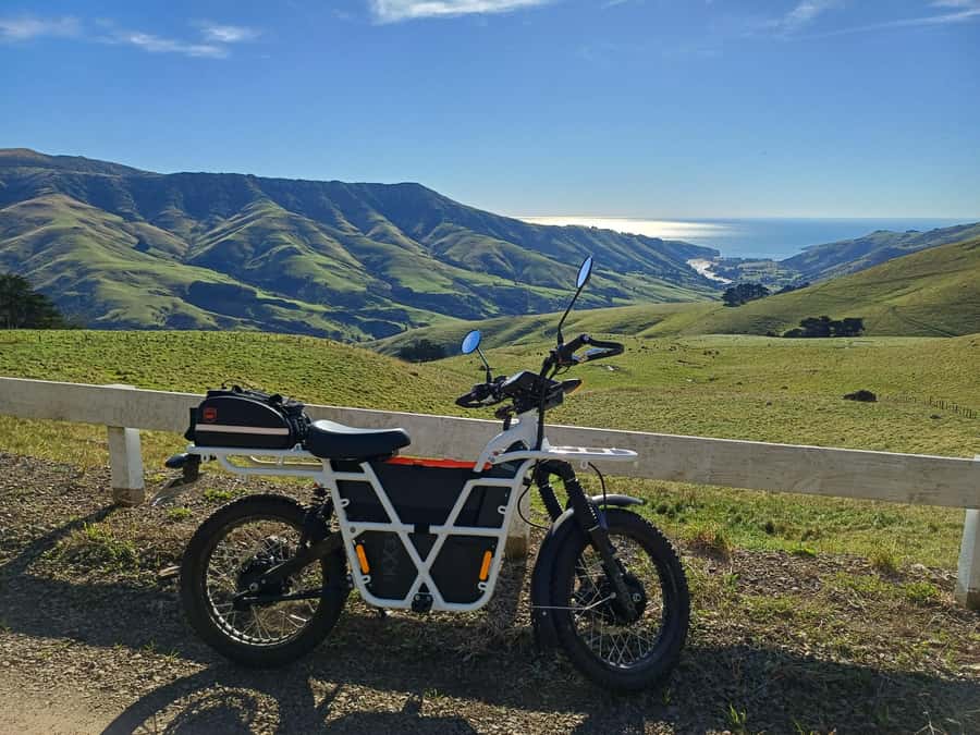 Akaroa: Lonely Beach Trail by E-Scooter. selfguided day out - Crater-rim views before the coast road