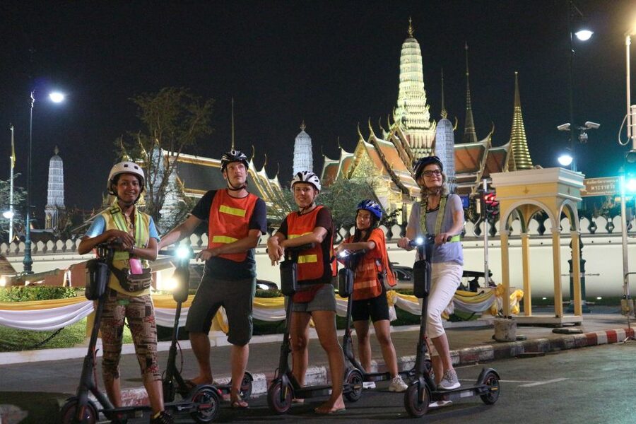 Bangkok: E-Scooter Night Tour with Local Street Food - The first ride: training, local lanes, and a temple stop