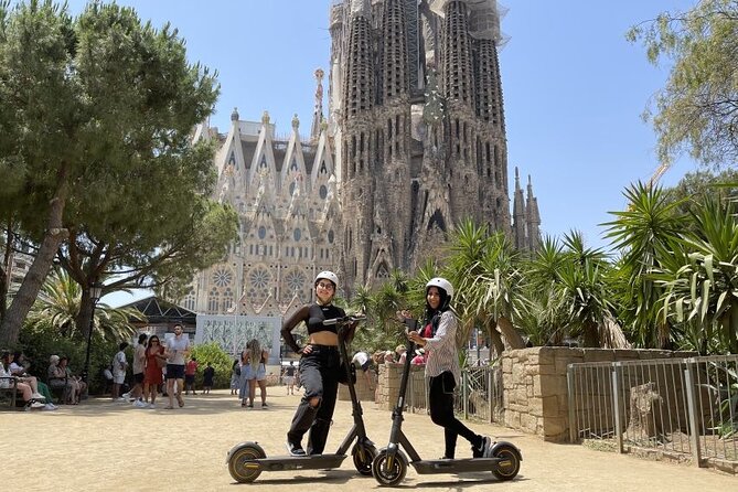 Barcelona Guided 2 hour E-Scooter Tour - Ciutadella Park adds shade, water, and civic Barcelona
