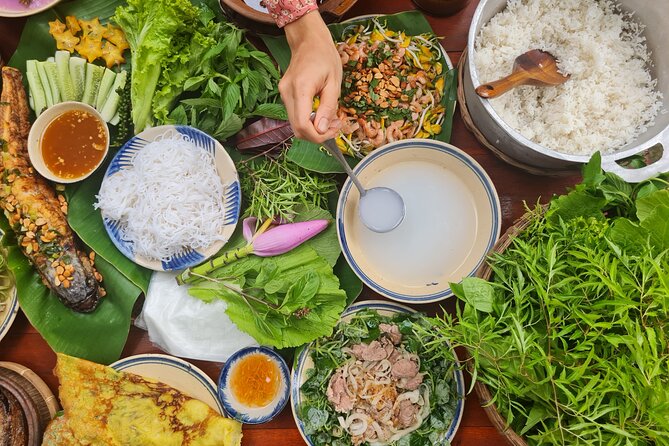 Ben Tre: Scooter, Culture, Sailboat and Mekong Food (Half Day) - A quiet sailboat on a Mekong branch