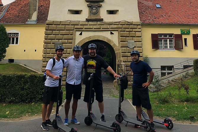 Brasov Old Town Guided Tour With Electric Scooters - Schei district, St. Nicholas Church, and the old gates