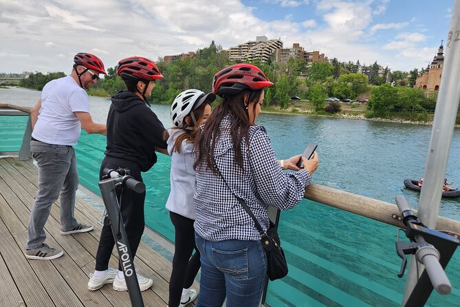 Calgary City Highlights 2 Hour E-Scooter Tour - Riding beside the Bow River