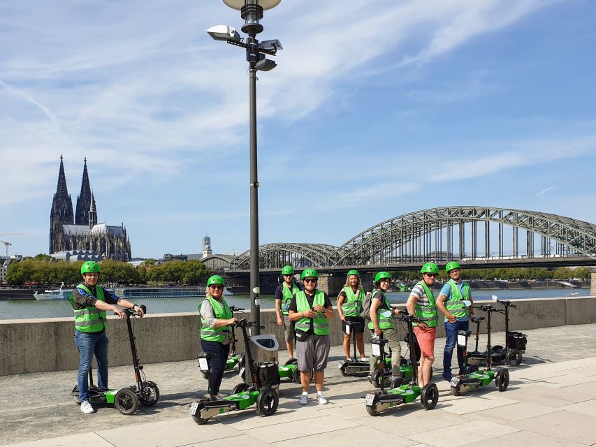 Cologne: Guided E-Scooter Tour - Groß St. Martin and the Rhine promenade
