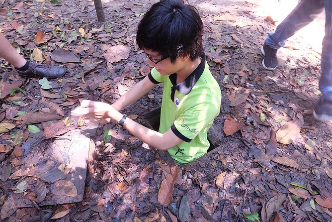 Cu Chi Tunnels By Motorbike and Scooter - The rubber tree farm adds local context