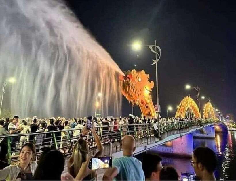 DaNang Night City Scooter Tour-Lady Aodai Rider & Han Cruise - A scooter ride through Da Nang after dark