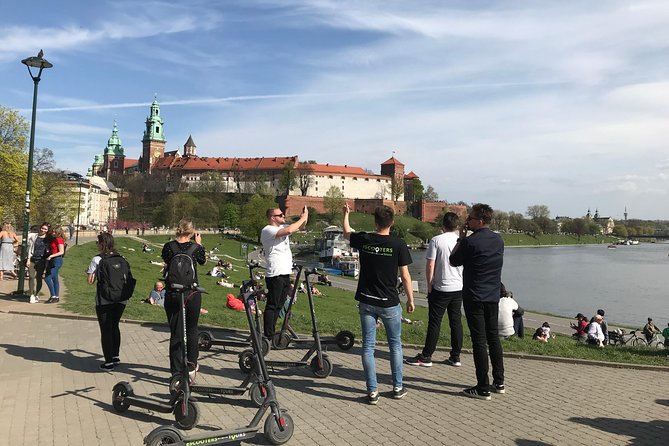 Electric Scooter Tours Kraków - Wawel Castle beside the Vistula