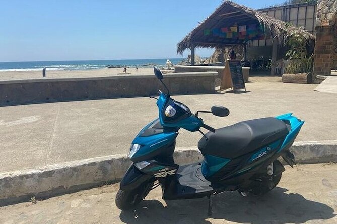 Enjoy scooter rental - Riding from the resort area to La Crucecita