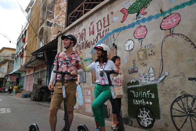 Explore Bangkok by E-Scooter & Try Street Food - Wat Prayurawongsawat and a Riverside Pause