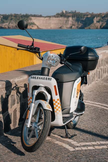 Explore Procida on an Electric Scooter: Daily Rental with All the Perks - What the battery service really adds