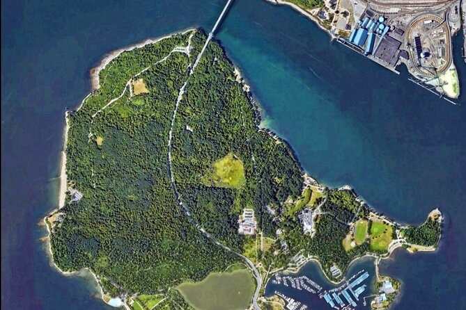 Explore Stanley Park on Electric Scooters - Siwash Rock and the forested coast