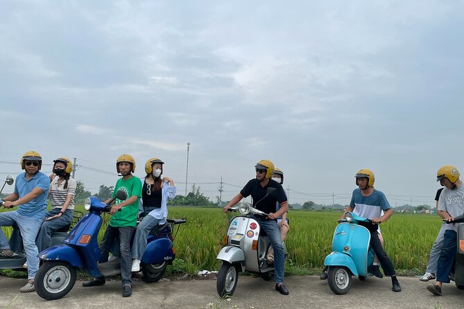 Exploring Vespa Tour Through Little Red River Delta - Leaving Hanoi by classic Vespa