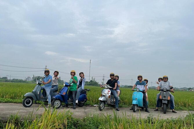 Exploring Vespa Tour Through Little Red River Delta - Rice fields, village roads, and everyday life