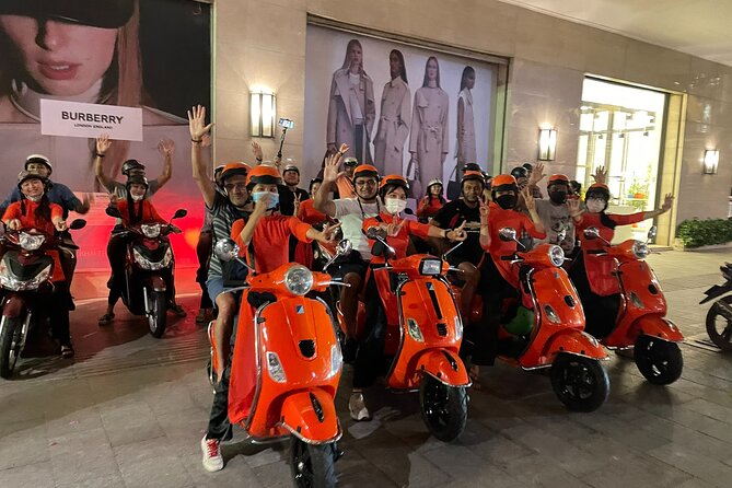 Female Riders Vespa Night Street Food + Train Street food 4 Hours - A quieter ride around Ba Dinh Square