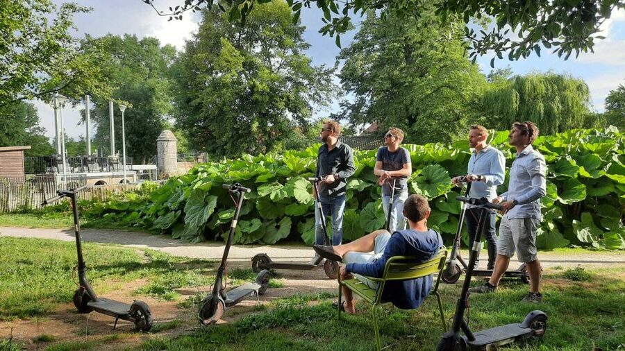 From Bruges to Damme: Private Electric Scooter tour - Market Square, Cranenburg House, and the city’s stories
