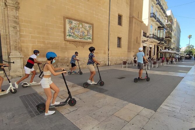 Glide through Valencia by Electric Scooter - Who will enjoy this ride most