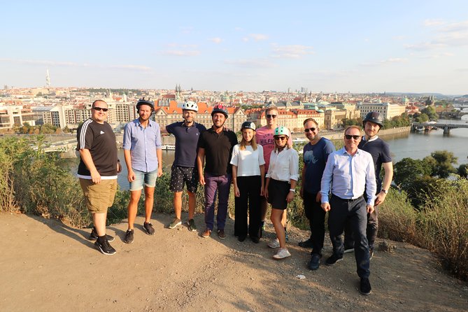 Grand City Tour of Prague on Cruiser e-Bikes or e-Scooters - Kampa Park, the Lennon Wall, and Charles Bridge