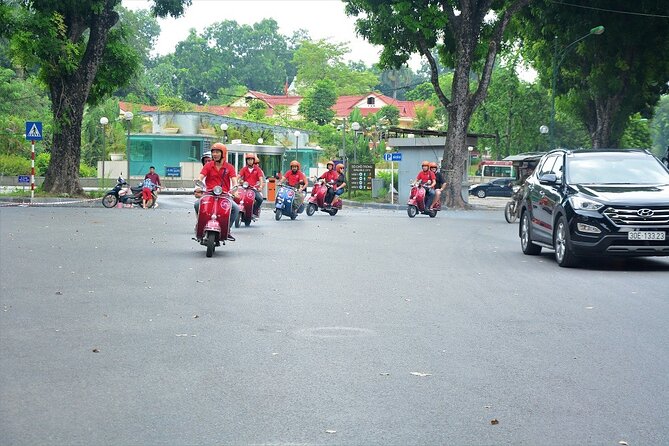 Hanoi Back Streets Vespa Tours: Hanoi Vintage Vespa Tours City - Lakes, landmarks, and the changing face of Hanoi