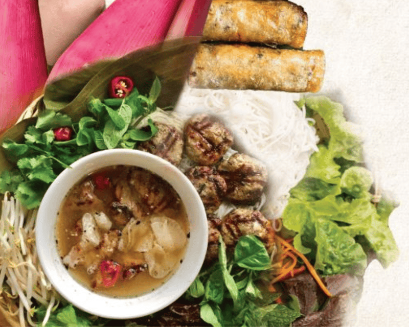 Hanoi: Food and Sightseeing Vespa Tour with 7 Tastings - Aunt Tu’s snail seafood stop