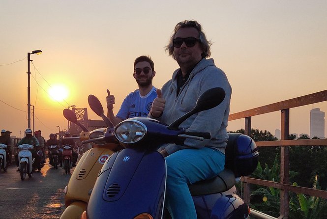 HANOI MUST SEE SITES Vespa Tour - Crossing Long Bien Bridge over the Red River