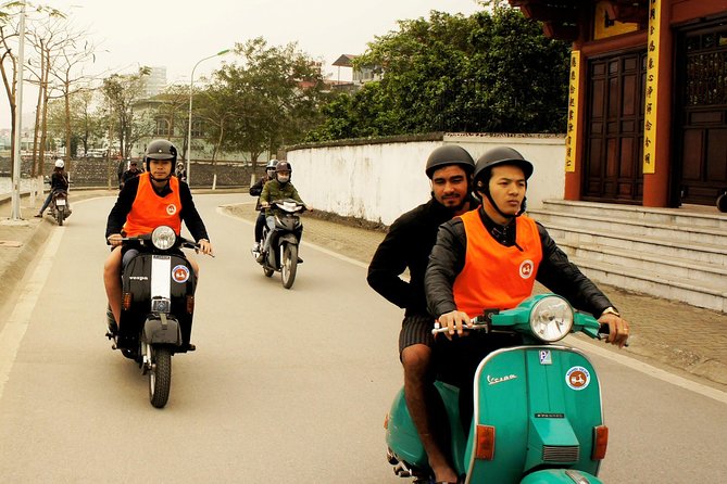 HANOI MUST SEE SITES Vespa Tour - A brief look at Hanoi’s train street