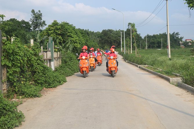 Hanoi Vespa Full Day City & Countryside with Female Ao Dai Riders - West Lake and the B52 crash site