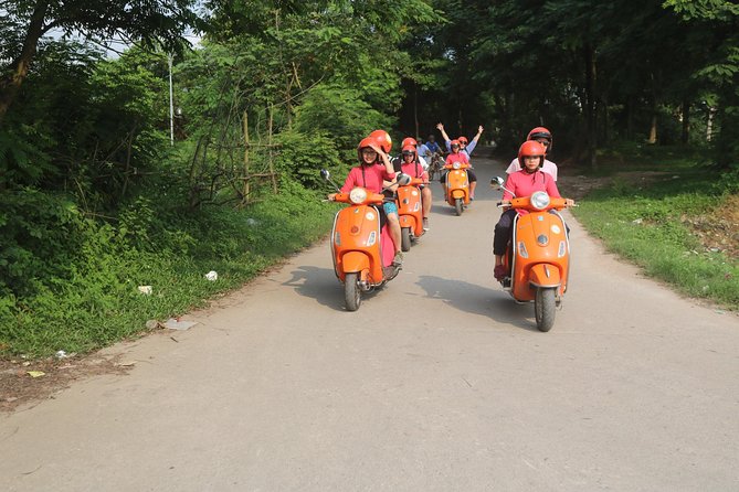 Hanoi Vespa Full Day City & Countryside with Female Ao Dai Riders - An Duong Market and Ba Dinh Square