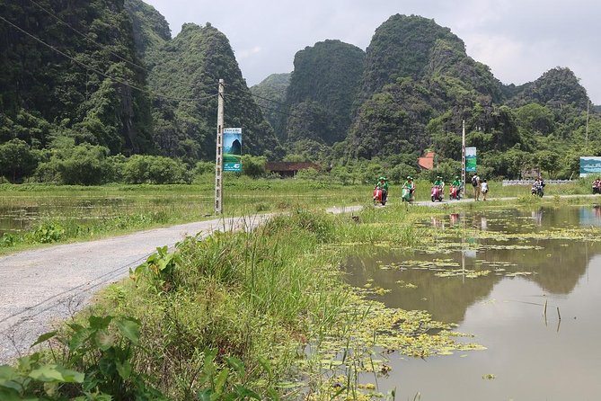 Hanoi Vespa Tour Explore Red River Delta & Rural Villages 5 Hours - What the guide and riders add