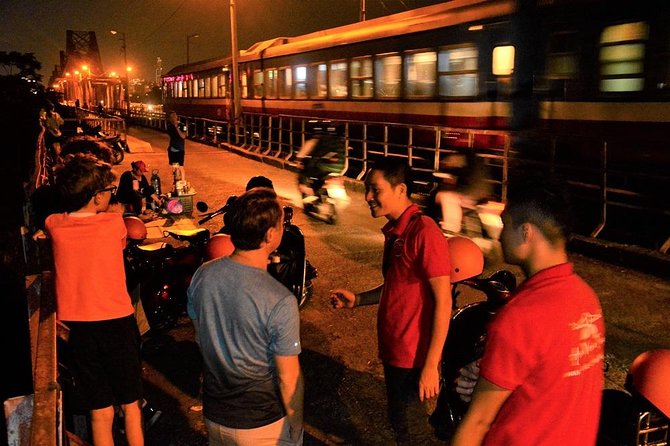Hanoi Vespa Tours: Hanoi After Dark Vespa Food Tours - Old Quarter streets, lanterns, and the Train Street area
