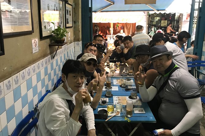 HCM City Local Street Food by scooter/ Aodai Rider Saigon tour - Markets, flowers, and the working city