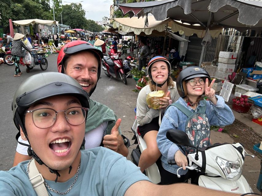 HCM City: Sightseeing Tour with Coffee and Fruit by Scooter - Walking through the old apartment area