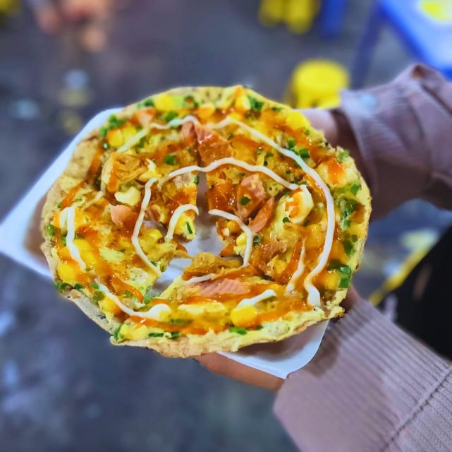 Ho Chi Minh City: Food Tour by Scooter with Eleven Tastings - Chợ Hồ Thị Kỷ and the flower-market food scene