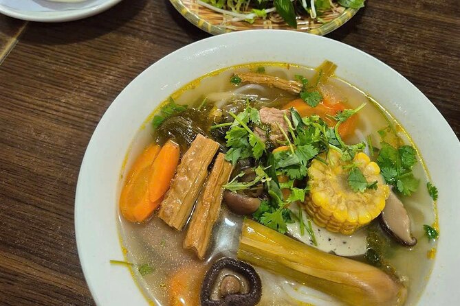 Ho Chi Minh City: Local Food Tour by Scooter with Vegan Option - Stop 5: The oldest apartment complex in Saigon