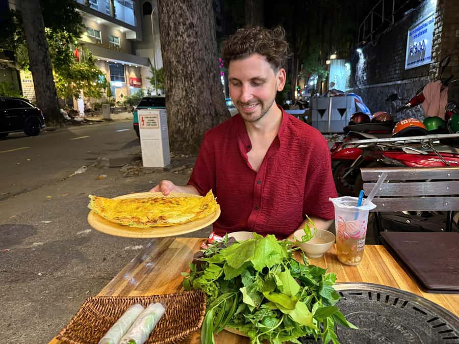 Ho Chi Minh: Local Food Tour by Scooter with Vegan Option - Vietnamese pizza, grilled rice paper, and local snacks