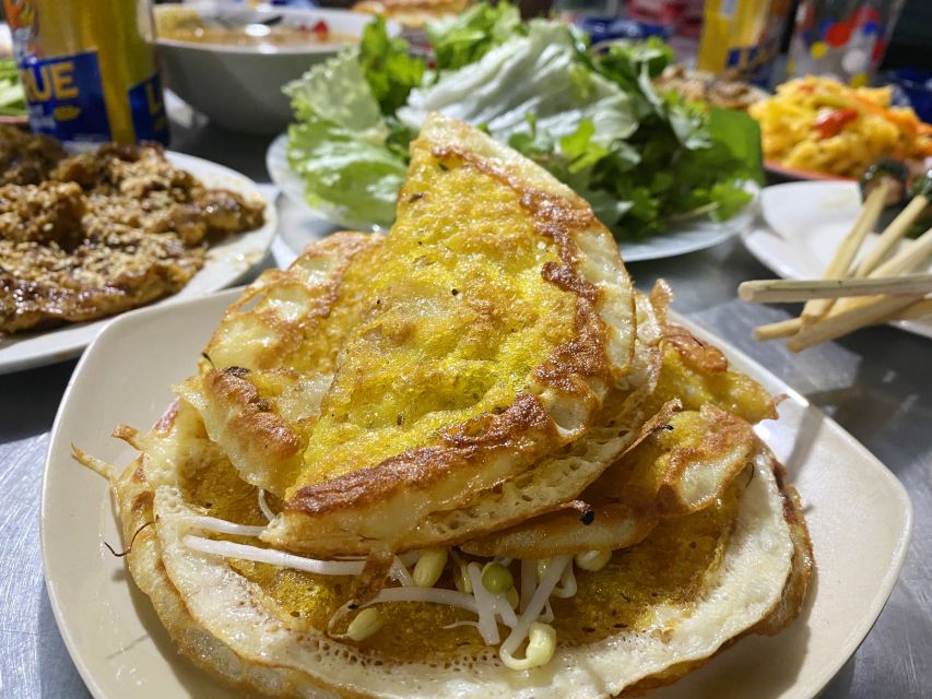 Hoi An: Evening Food Culture Tour by Vespa - Seafood, street-side cooking, and family recipes