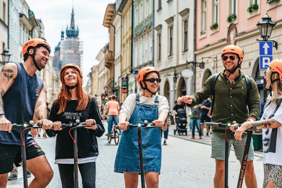 Krakow: Guided E-Scooter City Tour with Food Tastings - St. Mary’s Basilica, Florian’s Gate, and the university