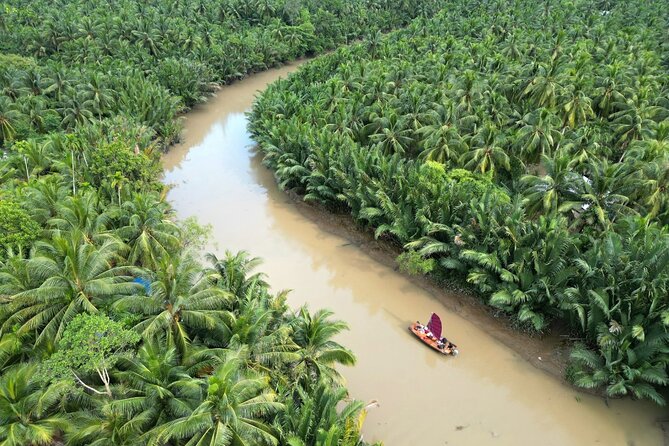 Mekong Wheels & Waters: Scooter, Sailboat, and Savory Food - Lunch, coconut candy, and canals at Ba Danh Homestay