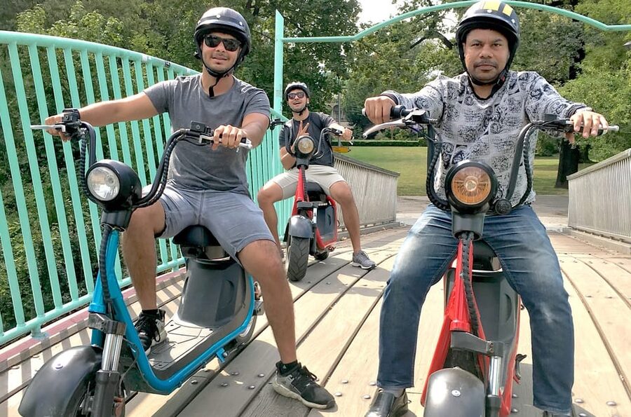 Prague Electric Scooter and eBike Grand Tour - Charles Bridge, the National Theatre, and central Prague