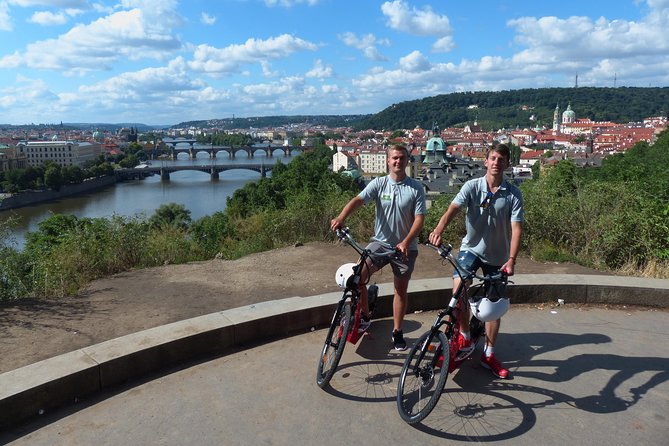 Prague Fat Tire or Regular Scooter City Tour - Petrin Tower appears from a distance