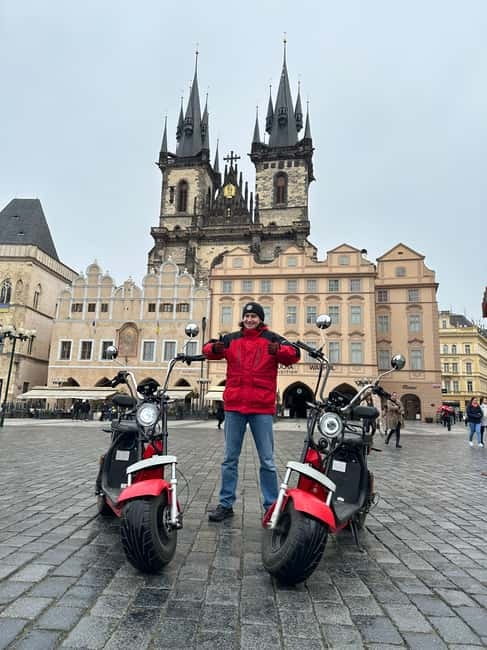 Prague: Guided Fat Tire e-Scooter Tour - Prague’s narrowest street and the Lennon Wall