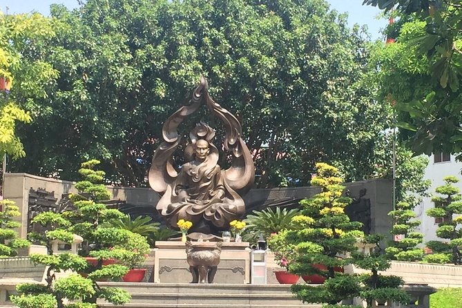 Private Saigon Sightseeing Tour by Scooter - District 5, Chinatown, and Binh Tay Market