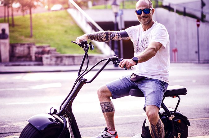 Private Stag Do Tour: Fun E-Scooter Ride with Games in Budapest - Rudas Baths and the Castle Garden