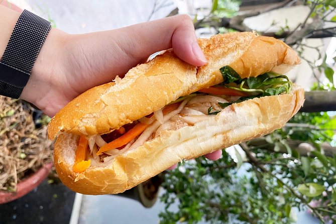 Private Street Food Tour by Scooter in Ho Chi Minh City - Pho, banh mi, banh xeo, and more