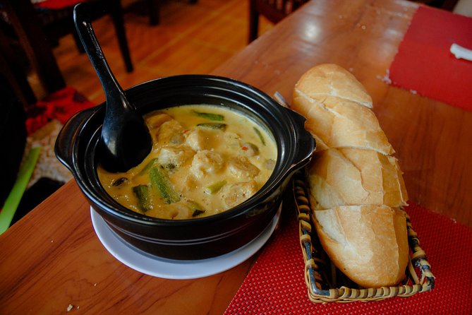 Private Vegan Food Tour By Scooter in Ho Chi Minh City - District 5 and District 4 after dark