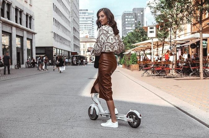 Rent Electric Scooter - Combining parks, rivers, and café stops