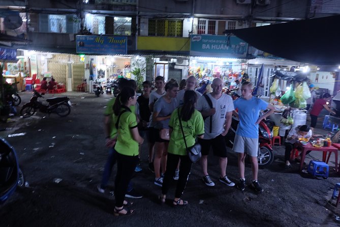 Saigon After Dark and Street Food by Motorbike and Scooter - Walking Nguyen Thien Thuat and its local food culture