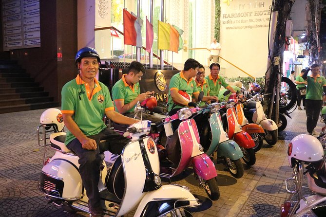 Saigon After Dark Vespa Street Food Tour + Live Music 4 hours - Banh xeo and nem lui in a local shop